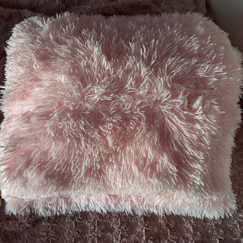 Pink shaggy throw blanket